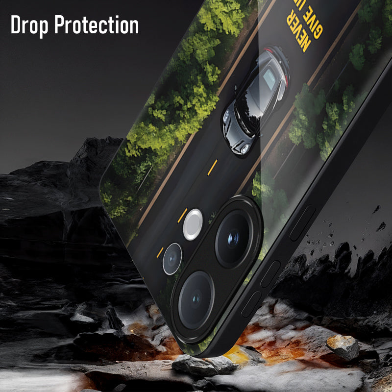Phone case with drop protection feature shown on a rocky surface
